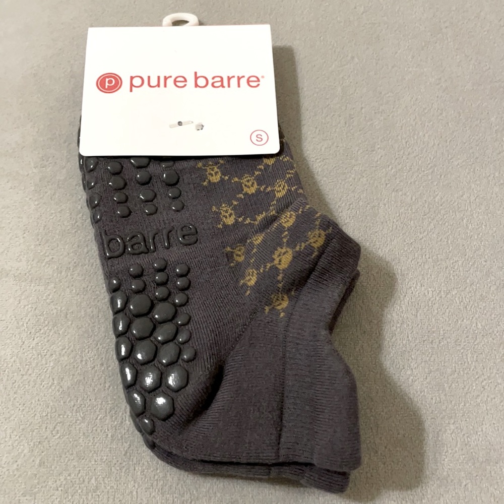 Size small Pure Barre brand dark grey skeleton socks. Perfect for Halloween!